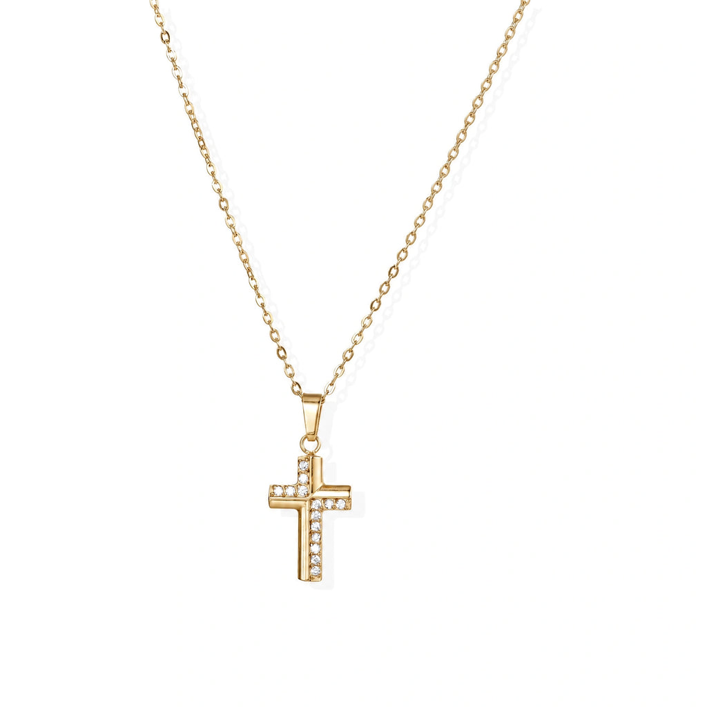 Gold-plated stainless steel cross necklace with crystal embellishments on adjustable chain against light background.