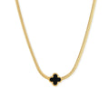 Dainty 18K gold-plated herringbone chain necklace with black enamel quatrefoil clover pendant on white background