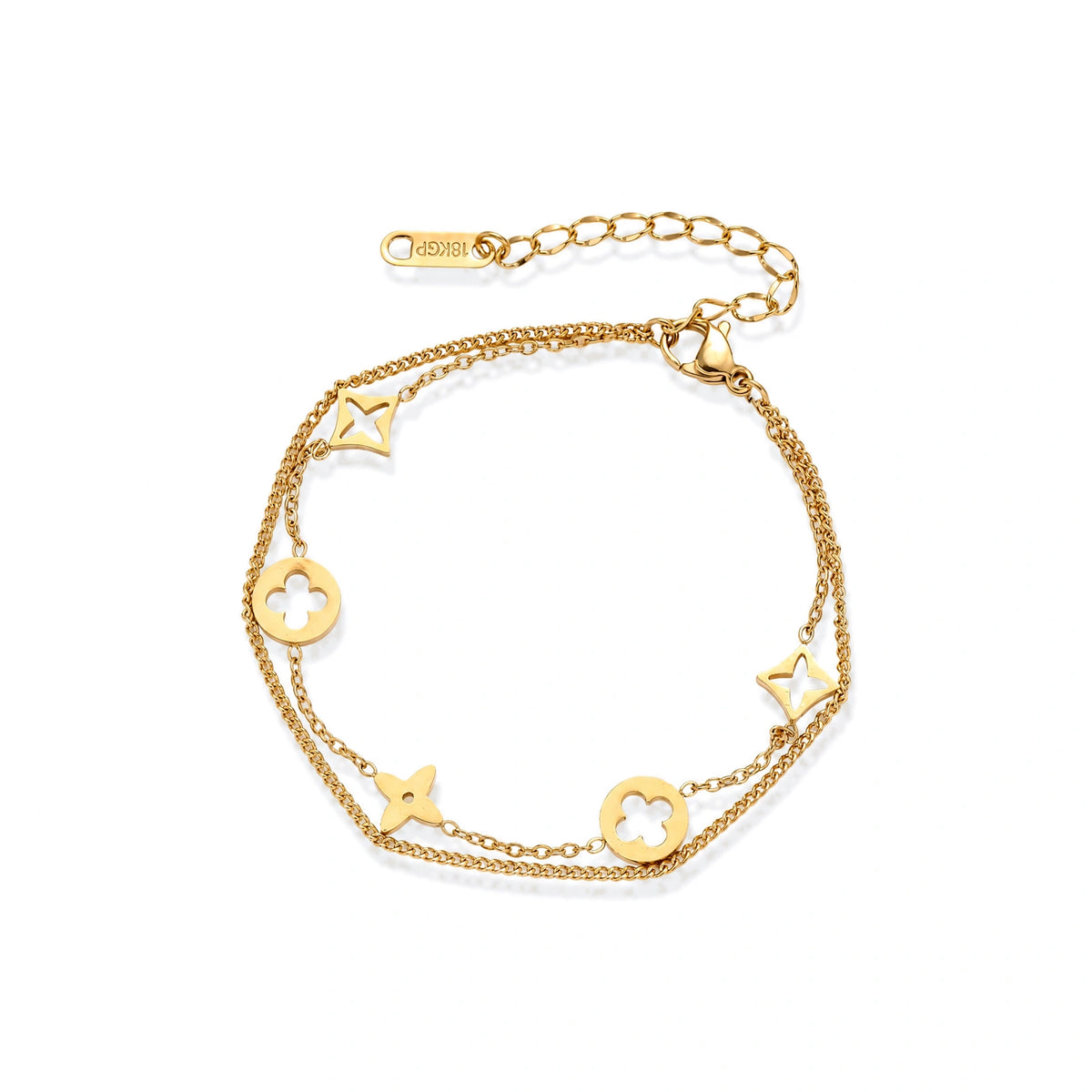 Double-layer gold-plated bracelet with quatrefoil and star charms on cream background, 18K gold finish.