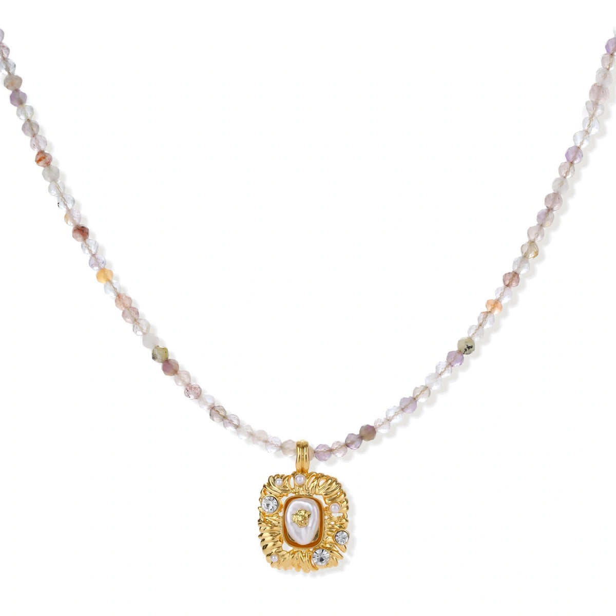 Ornate gold-plated pendant necklace with multicolored gemstone beads in purple, pink and clear tones on white background